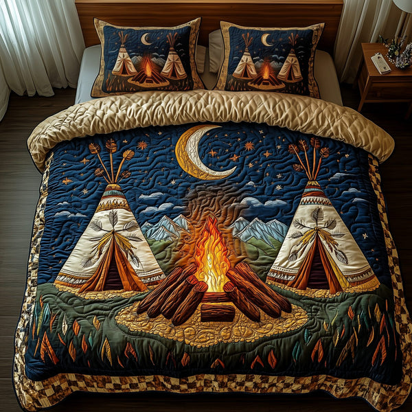 Native American Tent quilted 3-piece bedding set on a made bed in a warmly lit bedroom