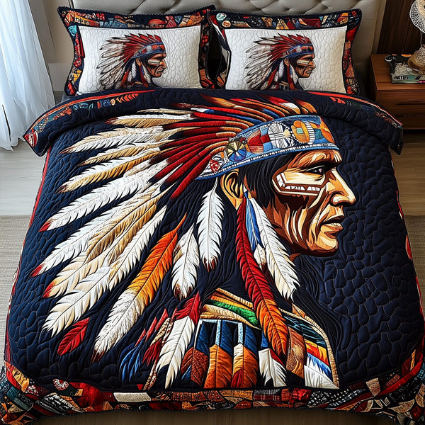 Native Essence quilted 3-piece bedding set on a made bed with two matching pillow shams