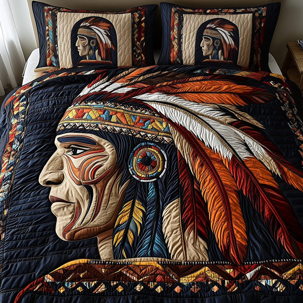 Native Essence quilted 3-piece bedding set on a made bed with two matching pillow shams