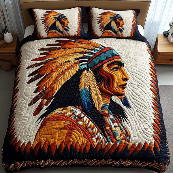 Native Essence quilted 3-piece bedding set on a made bed with two matching pillow shams