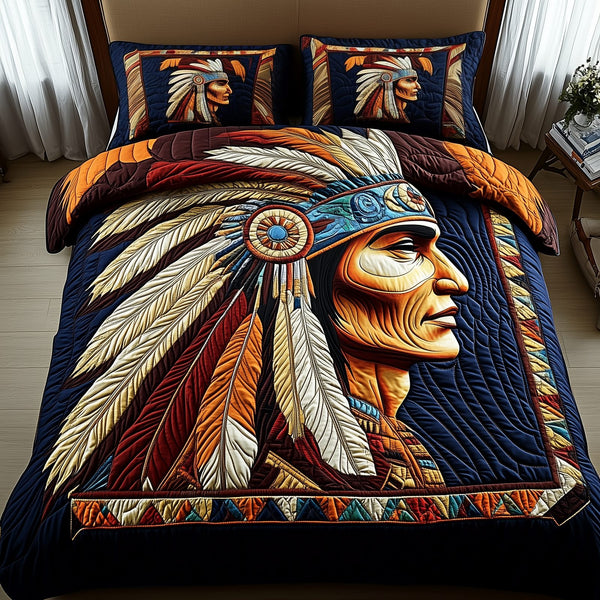 Native Essence quilted 3-piece bedding set on a made bed with two matching pillow shams
