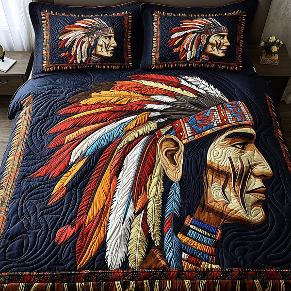 Native Essence quilted 3-piece bedding set on a made bed with two matching pillow shams