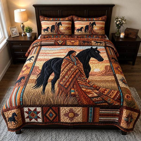 Native Queen quilted 3-piece bedding set on a made bed with two matching pillow shams