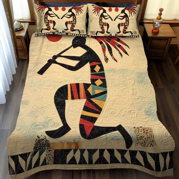 Native Reflections quilted 3-piece bedding set on a made bed with two matching pillow shams