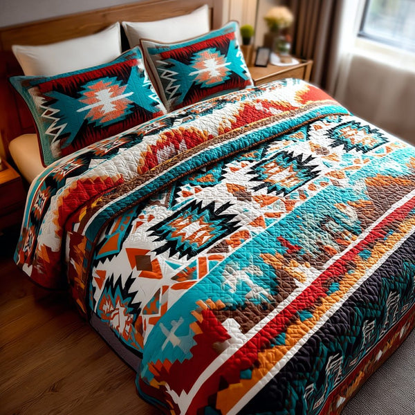Native Spirit quilted 3-piece bedding set on a made bed with two matching pillow shams