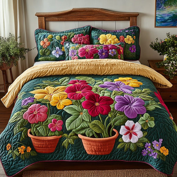 Nature Bloom quilted 3-piece bedding set on a made bed with two matching pillow shams