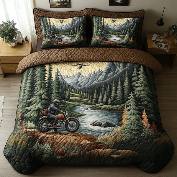 Nature Escape quilted 3-piece bedding set on a made bed with two matching pillow shams