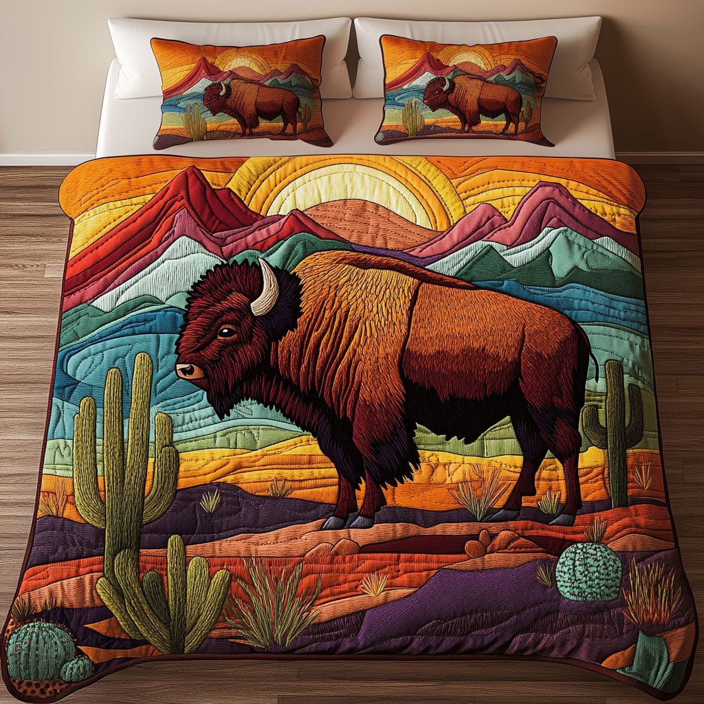Nature Guardian quilted 3-piece bedding set on a made bed with two matching pillow shams