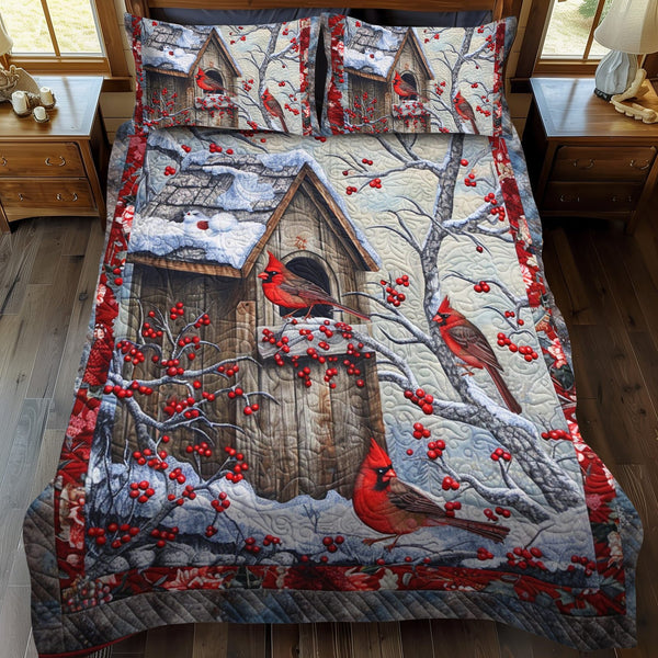 Nature-Inspired Cardinal quilted 3-piece bedding set on a made bed with two matching pillow shams