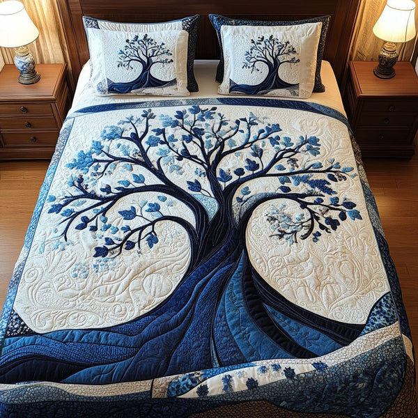 Nature Legacy quilted 3-piece bedding set on a made bed with two matching pillow shams