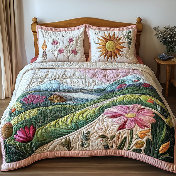 Nature's Symphony quilted 3-piece bedding set on a made bed with two matching pillow shams