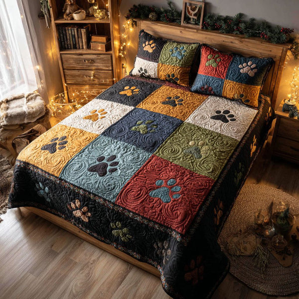 Nature Tracks quilted 3-piece bedding set on a made bed with two matching pillow shams
