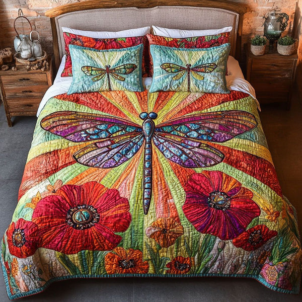 Natures Whispering Wings quilted 3-piece bedding set on a made bed with two matching pillow shams
