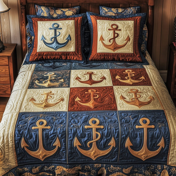 Nautical Anchor quilted 3-piece bedding set on a made bed in a light coastal bedroom