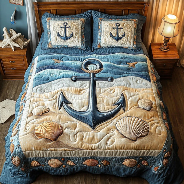 Nautical Anchor quilted 3-piece bedding set on a made bed in a light coastal bedroom
