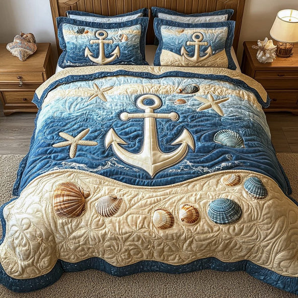 Nautical Anchor quilted 3-piece bedding set on a made bed in a light coastal bedroom