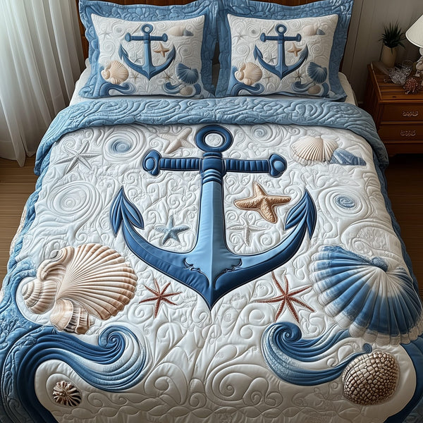 Nautical Anchor quilted 3-piece bedding set on a made bed in a light coastal bedroom