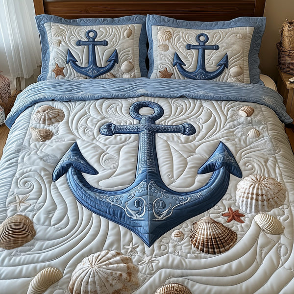 Nautical Anchor quilted 3-piece bedding set on a made bed in a light coastal bedroom