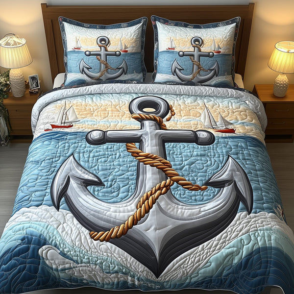 Nautical Anchor quilted 3-piece bedding set on a made bed in a light coastal bedroom