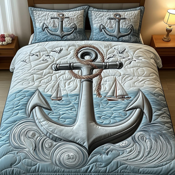 Nautical Anchor quilted 3-piece bedding set on a made bed in a light coastal bedroom