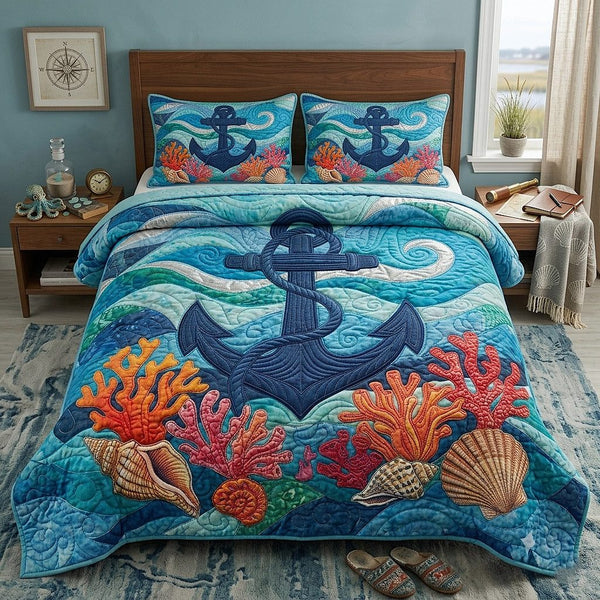 Nautical Anchor quilted 3-piece bedding set on a made bed in a light coastal bedroom