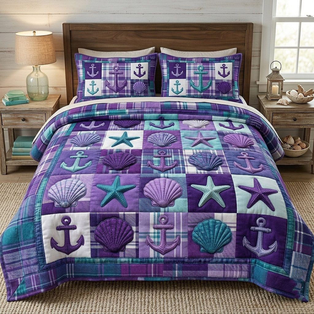 Nautical Anchor quilted 3-piece bedding set on a made bed in a light coastal bedroom