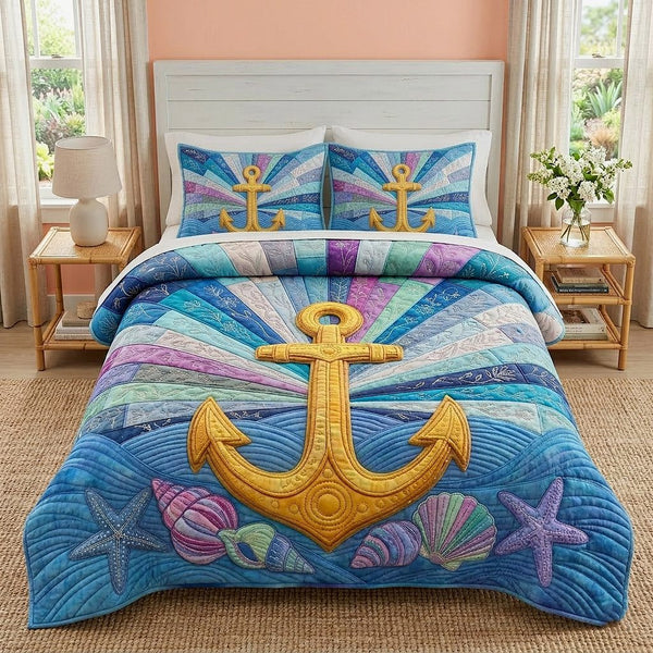 Nautical Anchor quilted 3-piece bedding set on a made bed in a light coastal bedroom