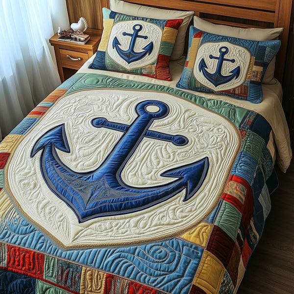 Nautical Anchor quilted 3-piece bedding set on a made bed in a light coastal bedroom