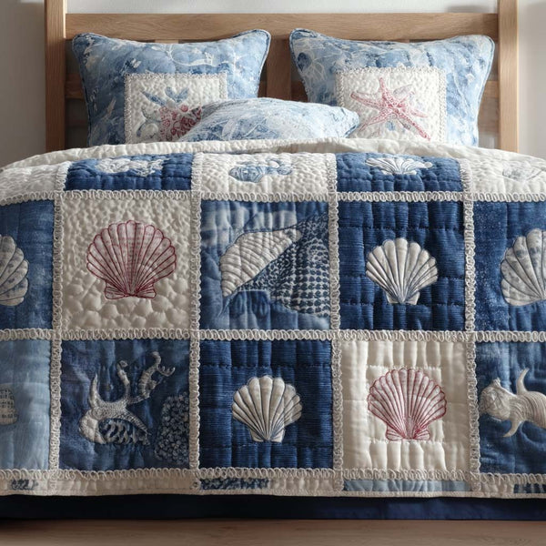Nautical Patchwork quilted 3-piece bedding set on a made bed in a light coastal bedroom