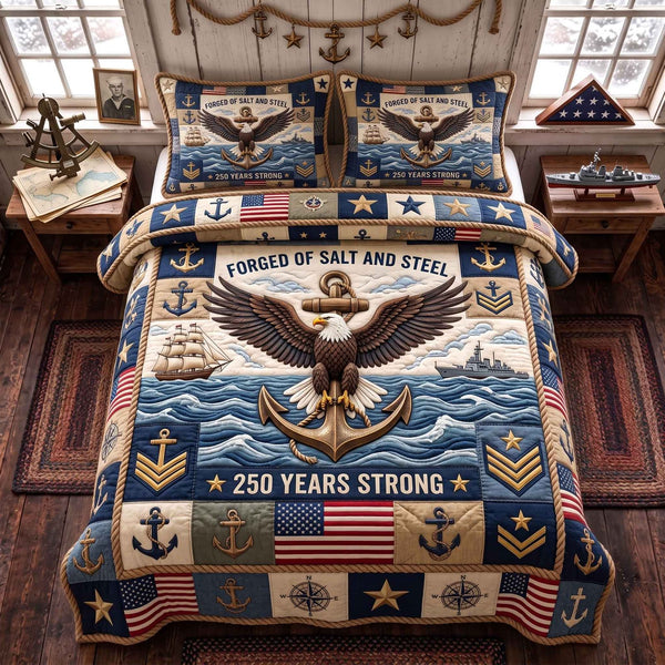 Navy Legacy quilted 3-piece bedding set on a made bed in a warmly lit bedroom