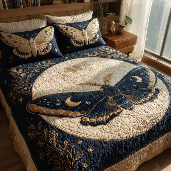 Navy Moth quilted 3-piece bedding set on a made bed in a warmly lit bedroom
