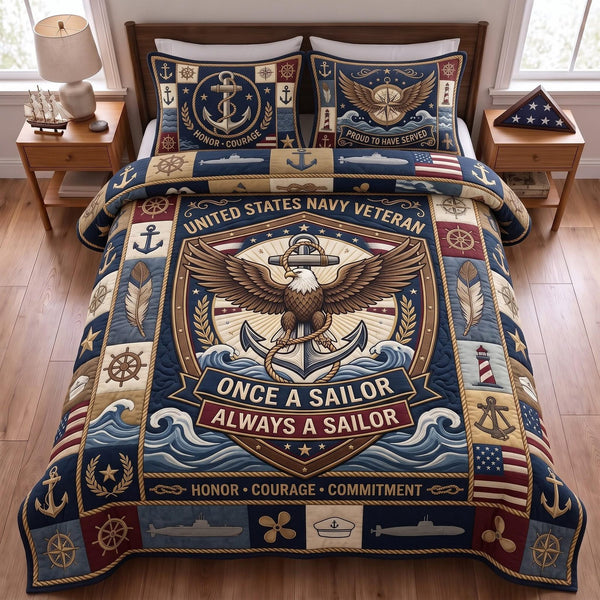 Navy Pride quilted 3-piece bedding set on a made bed in a warmly lit bedroom
