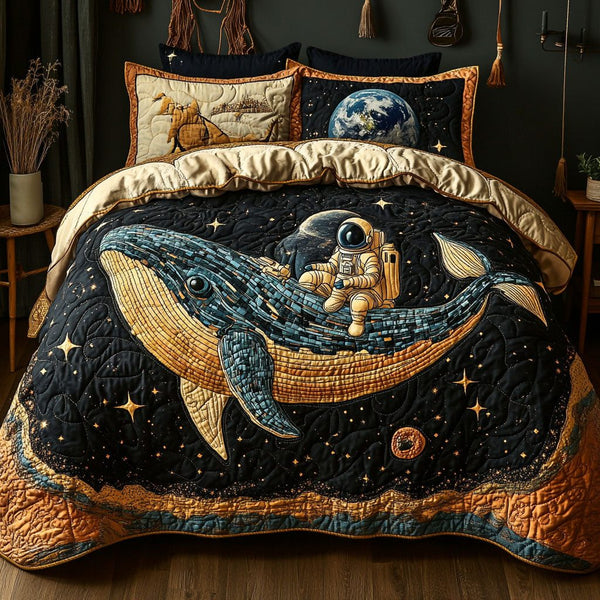 Nebula Whale Harmony quilted 3-piece bedding set on a made bed in a light coastal bedroom