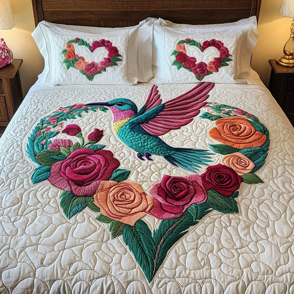 Nectar Bliss quilted 3-piece bedding set on a made bed with two matching pillow shams