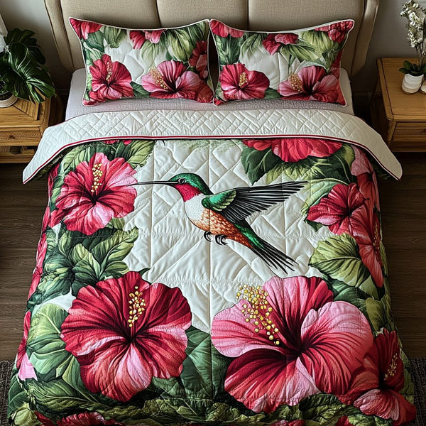 Nectar Charm quilted 3-piece bedding set on a made bed with two matching pillow shams