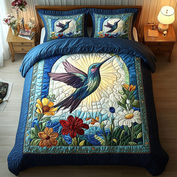 Nectar Dancer quilted 3-piece bedding set on a made bed with two matching pillow shams