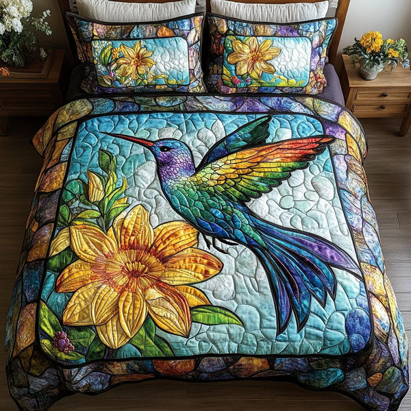Nectar Dancer quilted 3-piece bedding set on a made bed with two matching pillow shams