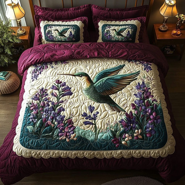 Nectar Delight quilted 3-piece bedding set on a made bed with two matching pillow shams