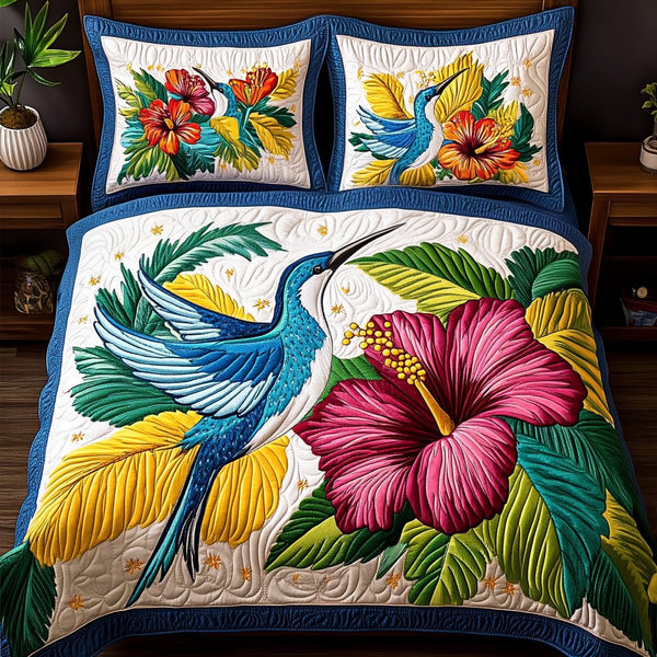 Nectar Dreams quilted 3-piece bedding set on a made bed with two matching pillow shams