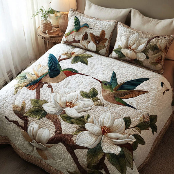 Nectar Kiss quilted 3-piece bedding set on a made bed with two matching pillow shams