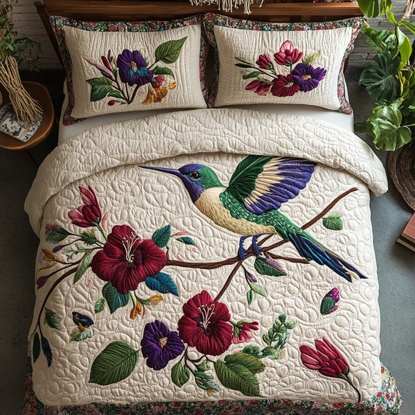 Nectar Kiss quilted 3-piece bedding set on a made bed with two matching pillow shams