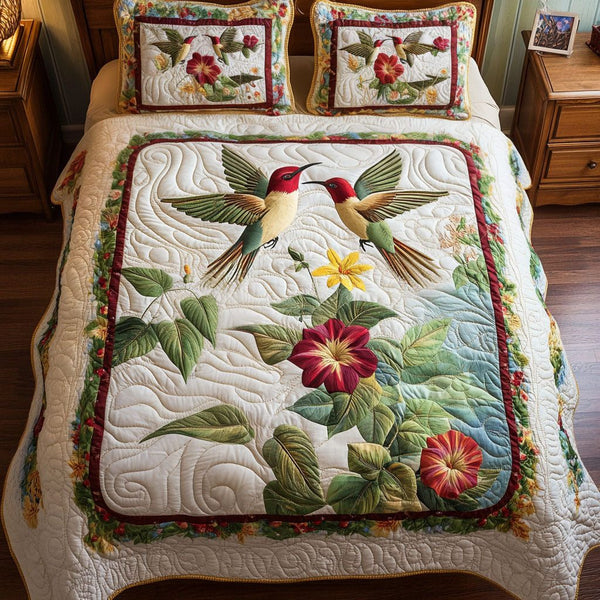 Nectar of Love quilted 3-piece bedding set on a made bed with two matching pillow shams