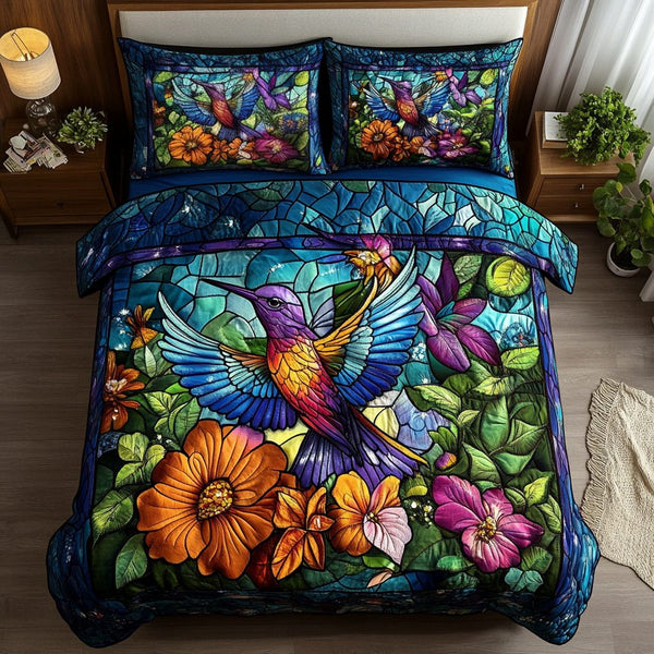Nectar Seeker quilted 3-piece bedding set on a made bed with two matching pillow shams