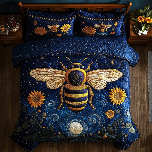 Nectar Seeker quilted 3-piece bedding set on a made bed with two matching pillow shams