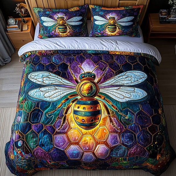 Nectar Seeker quilted 3-piece bedding set on a made bed with two matching pillow shams