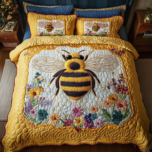 Nectar Trail quilted 3-piece bedding set on a made bed with two matching pillow shams