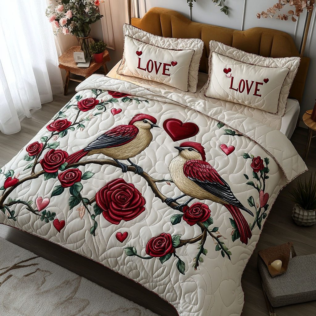 Nestled Together quilted 3-piece bedding set on a made bed with two matching pillow shams