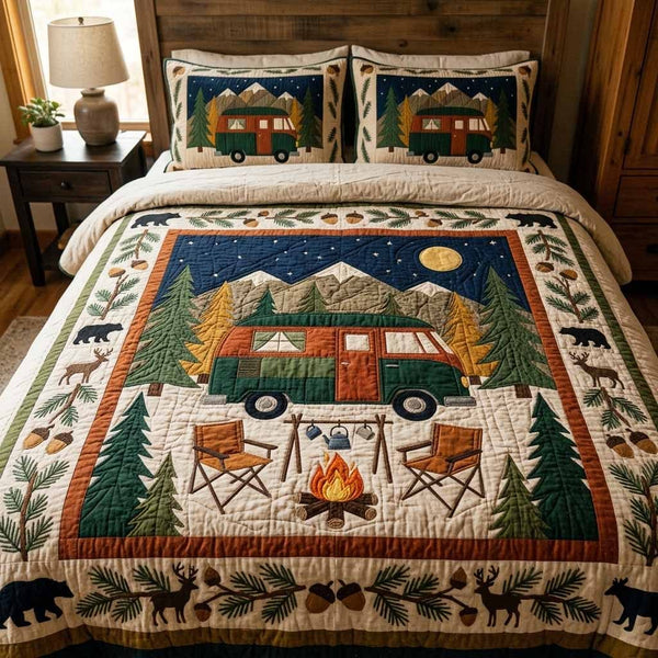 Night Camp quilted 3-piece bedding set on a made bed with two matching pillow shams