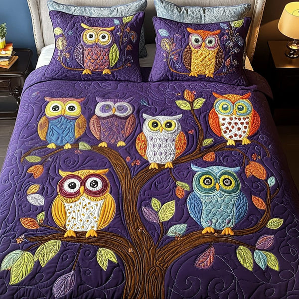 Night Watch quilted 3-piece bedding set on a made bed with two matching pillow shams