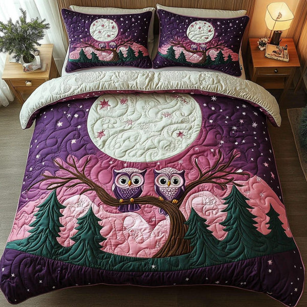 Nighttime Duo quilted 3-piece bedding set on a made bed with two matching pillow shams